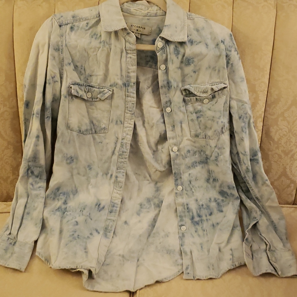 Bleach washed denim shirt.